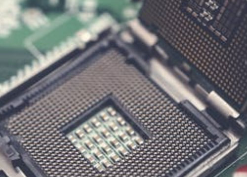 How do semiconductor manufacturers do factory testing of chips?